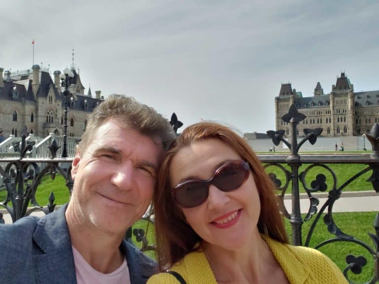 older couple traveling ottawa canada parliament