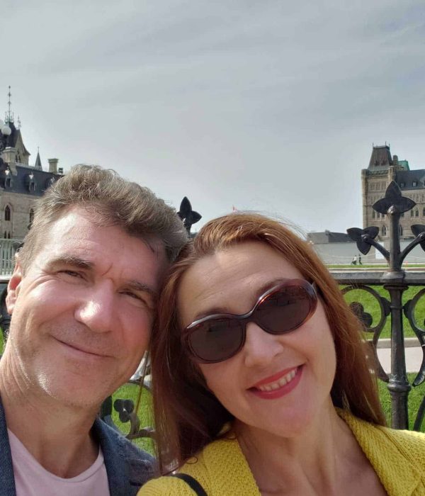 older couple traveling ottawa canada parliament